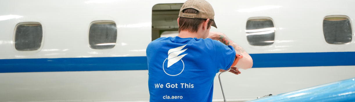 C&L Employee at Work on an Aircraft